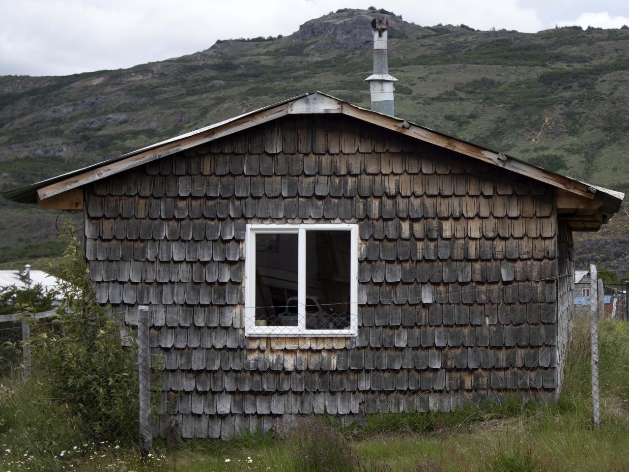 Casa Revestida de tejuelas, sector Puyuhuapi, Aysén,3.12.23. Fotógrafo Joel Martínez