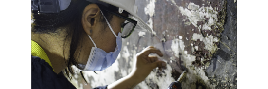 Proceso de readherencia de los estratos pictóricos levantados en Mural "Quinchamalí"